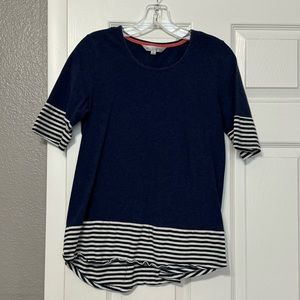 Blue shirt with white and black stripes